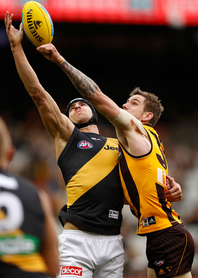 AFL 2016 Rd 18 - Hawthorn v Richmond MELBOURNE, AUSTRALIA - JULY 24: Ben Griffiths of the Tigers and Kaiden Brand of the Hawks compete for the ball during the 2016 AFL Round 18 match between the Hawthorn Hawks and the Richmond Tigers at the Melbourne Cricket Ground on July 24, 2016 in Melbourne, Australia. (Photo by Michael Willson/AFL Media)